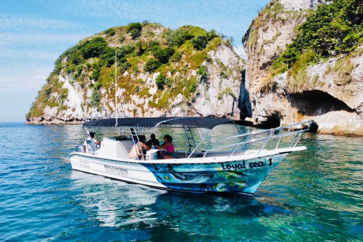 a small boat in a body of water