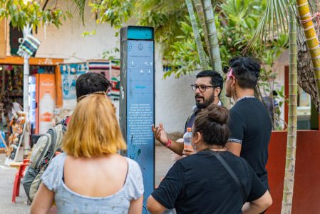 a group of people that are talking on a cell phone