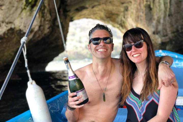 a person holding a wine glass