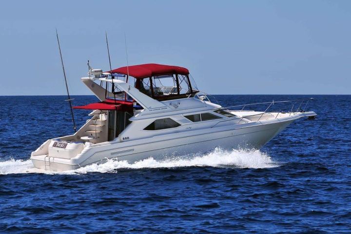 red ship in a body of water