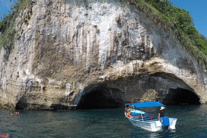 a small boat in a body of water