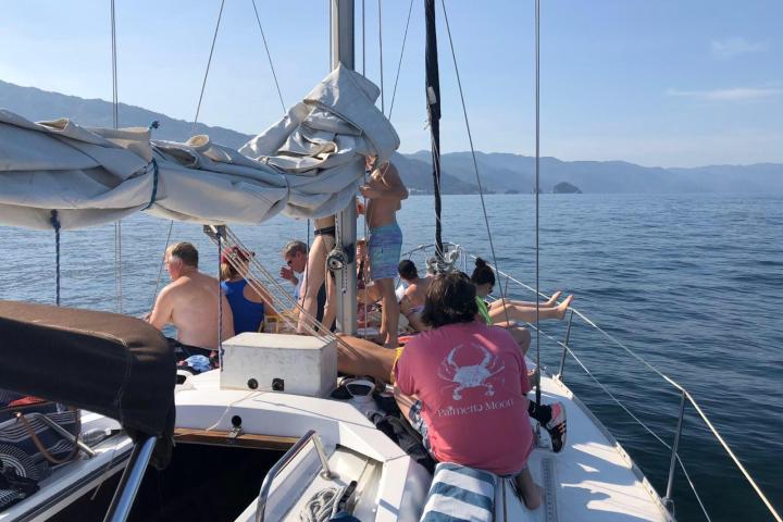 people sailing on a Hunter sailboat