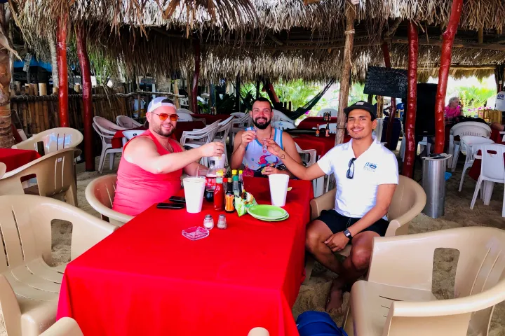 Sinan Gümüş et al. posing for the camera