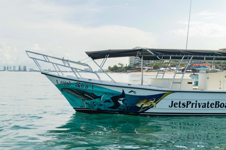 a small boat in a body of water