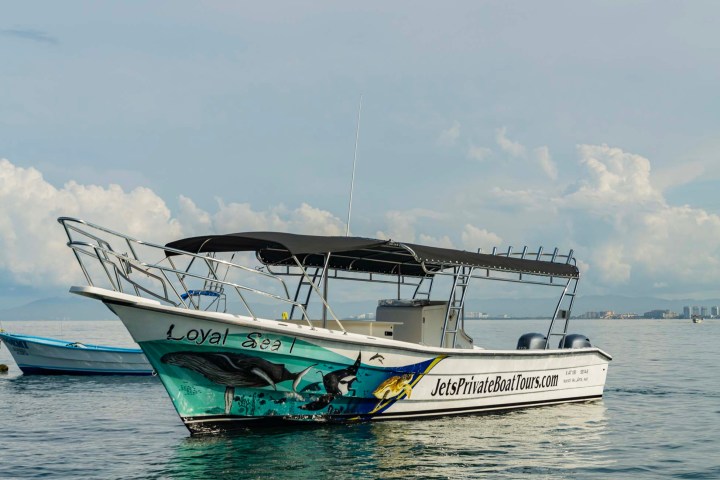 a small boat in a large body of water
