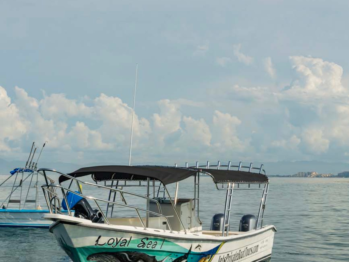 a small boat in a large body of water