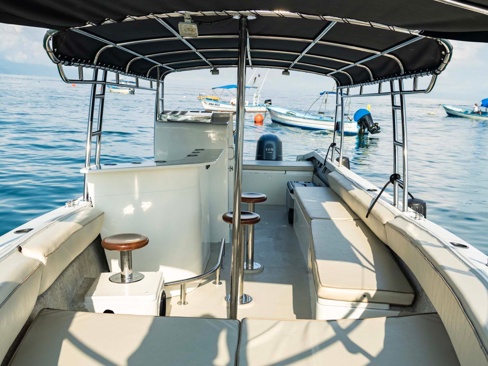 a boat is docked next to a body of water