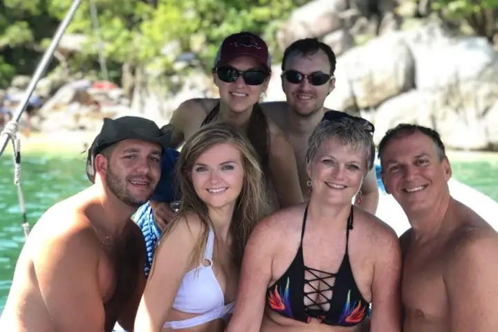 a group of people posing for the camera