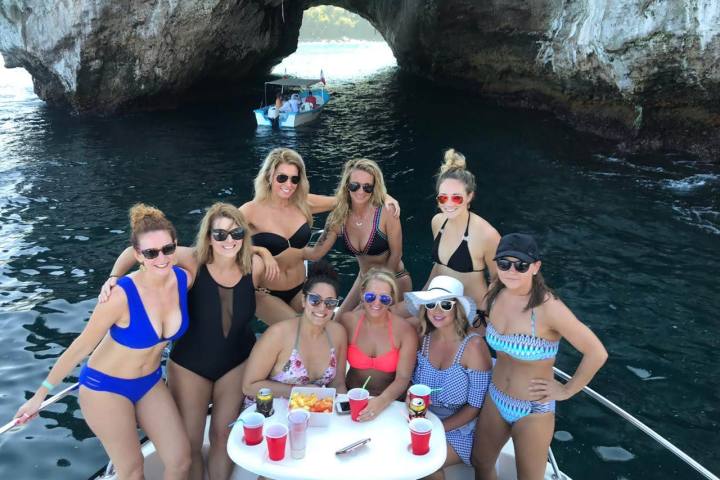 a group of people swimming in the water