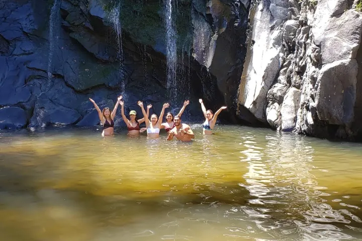 a group of people swimming in the water