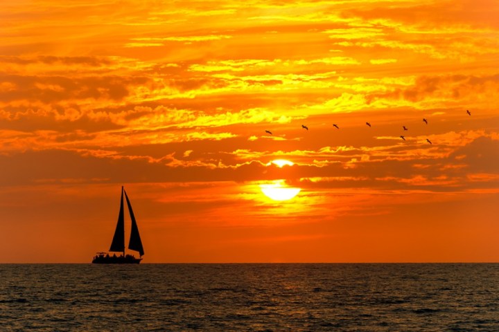 a sunset over a body of water