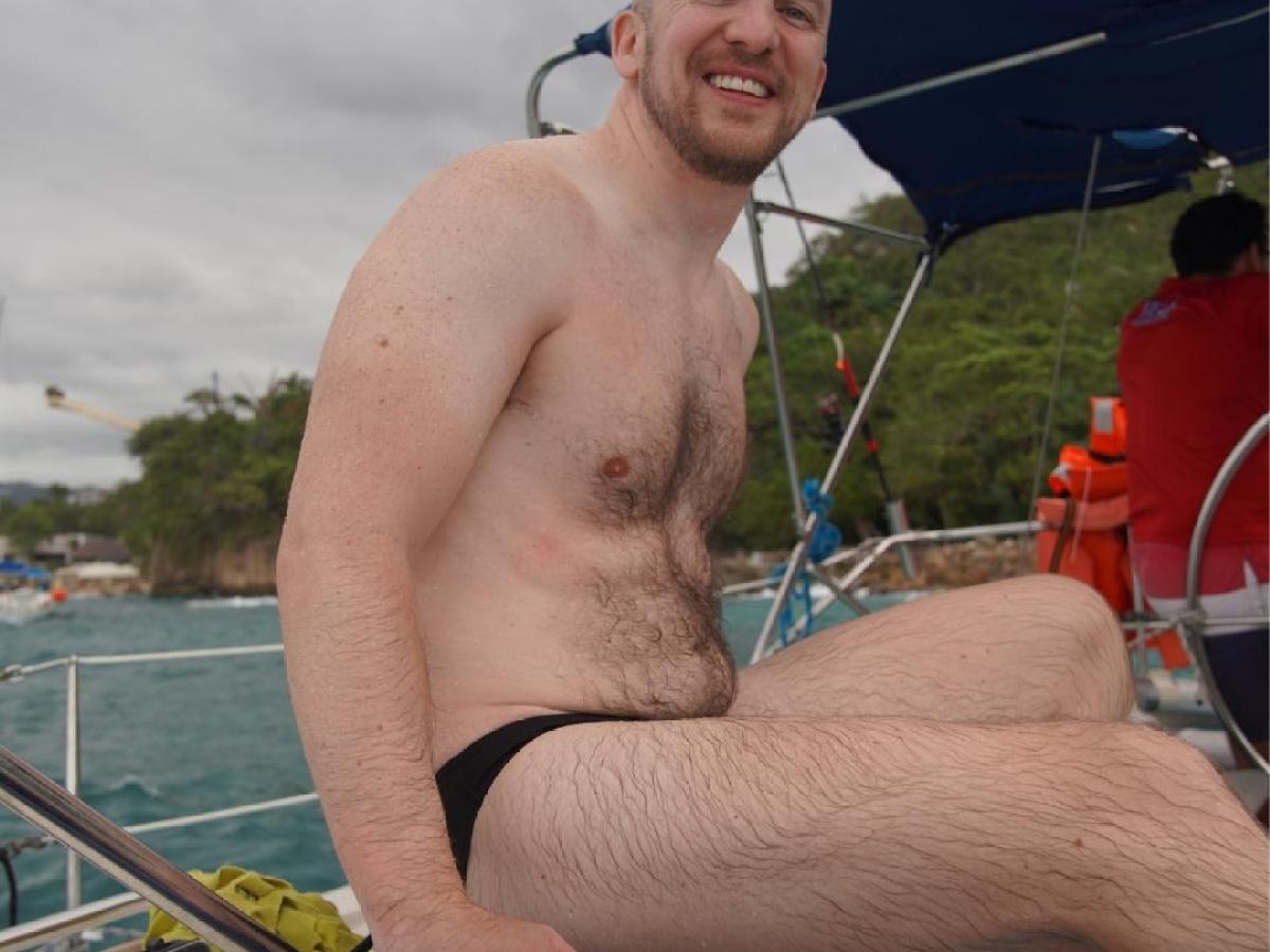 a man sitting on a boat