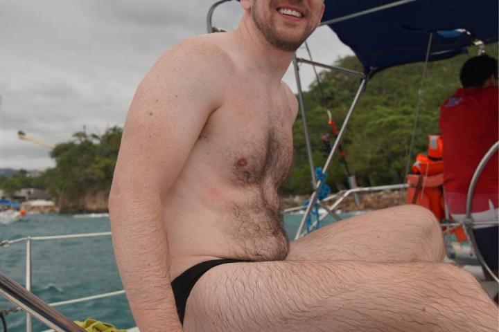 a man sitting on a boat