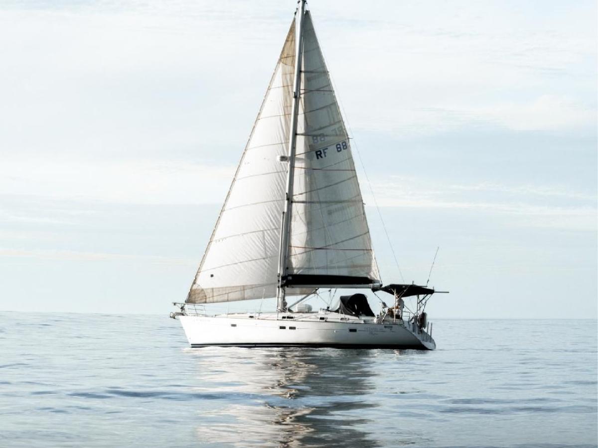 a small boat in a large body of water