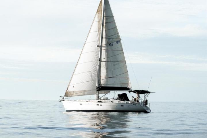 a small boat in a large body of water