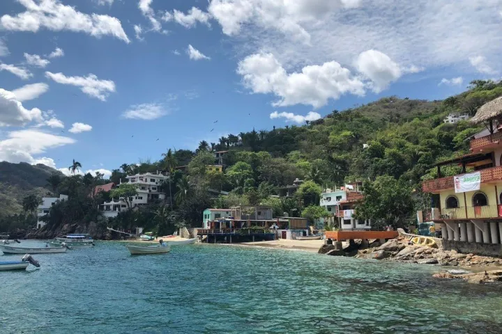 a small boat in a large body of water