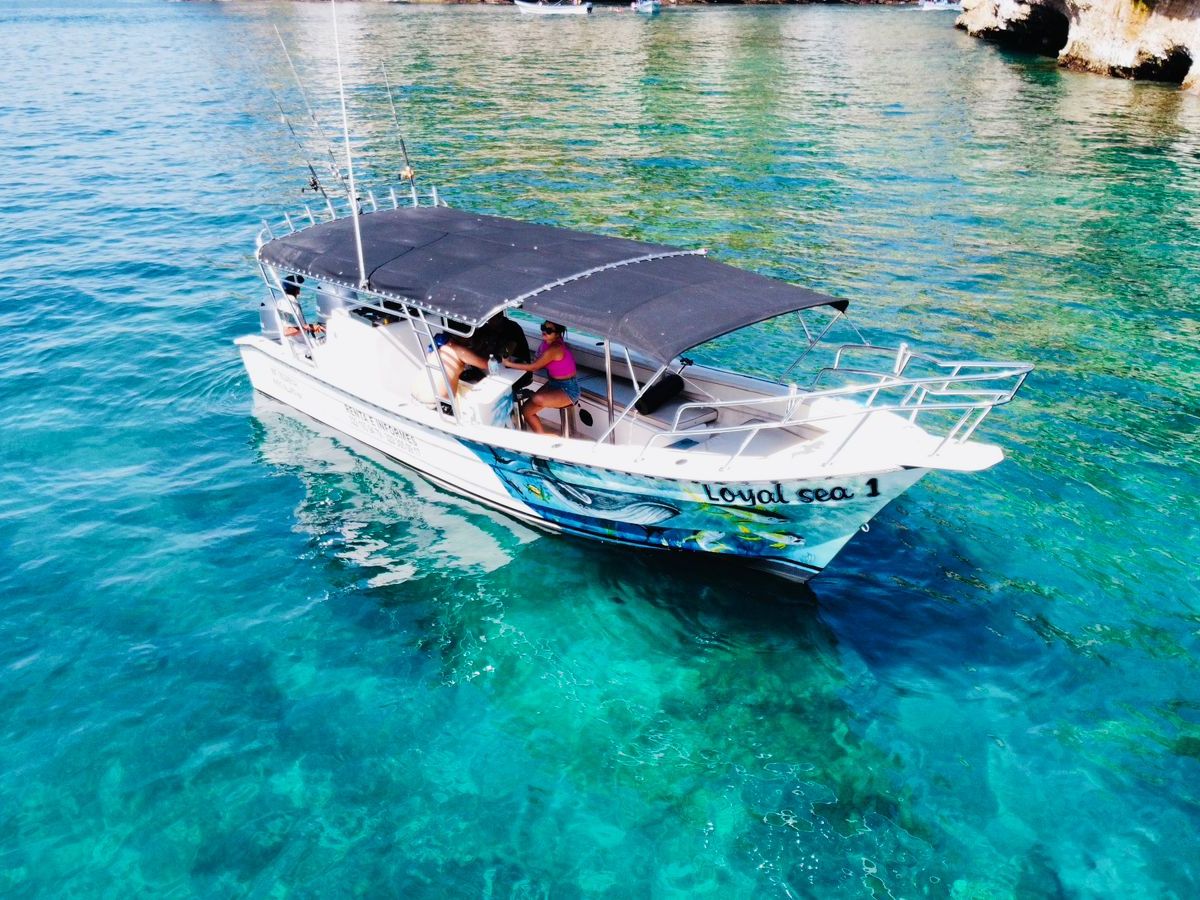 a small boat in a pool of water