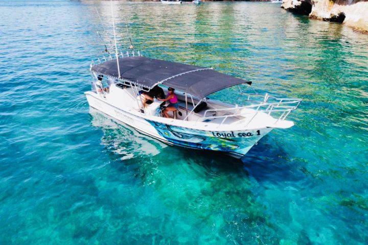 a small boat in a pool of water