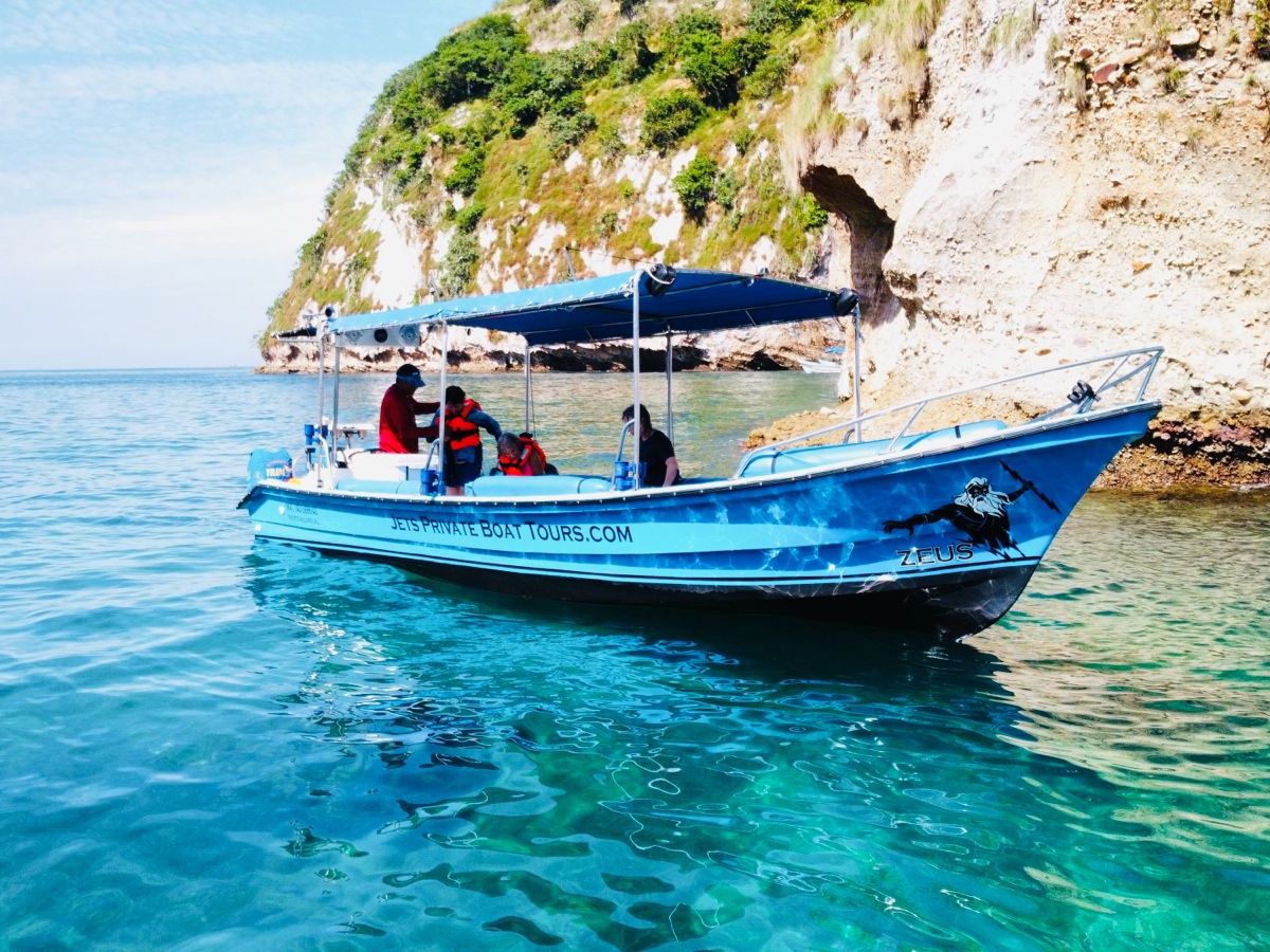 a small boat in a body of water