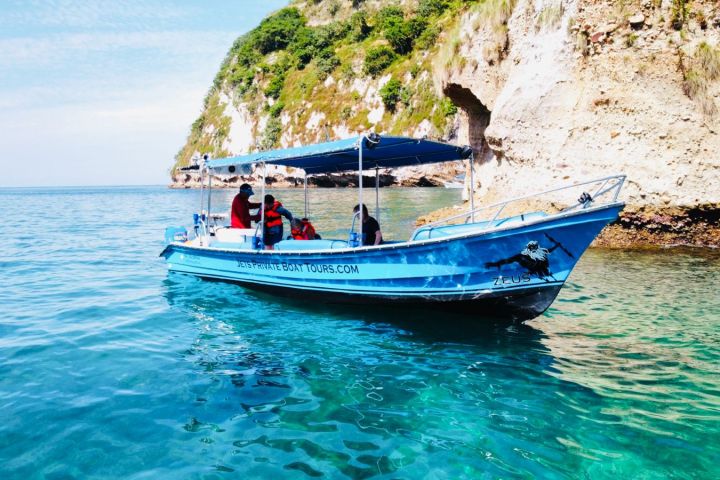 a small boat in a body of water