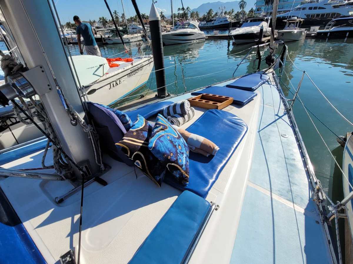 a boat is docked next to a body of water