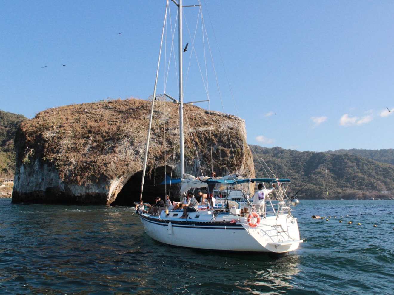 a small boat in a large body of water