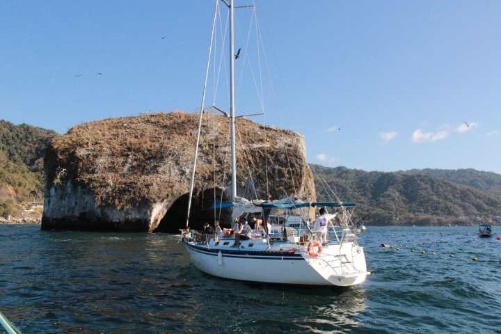 a small boat in a large body of water