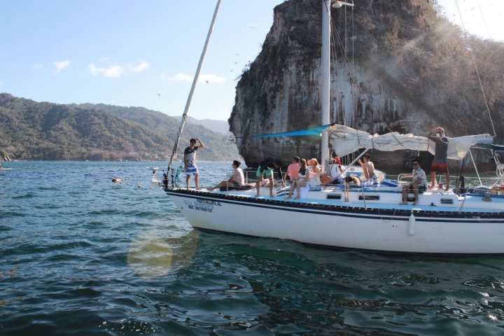 a small boat in a body of water