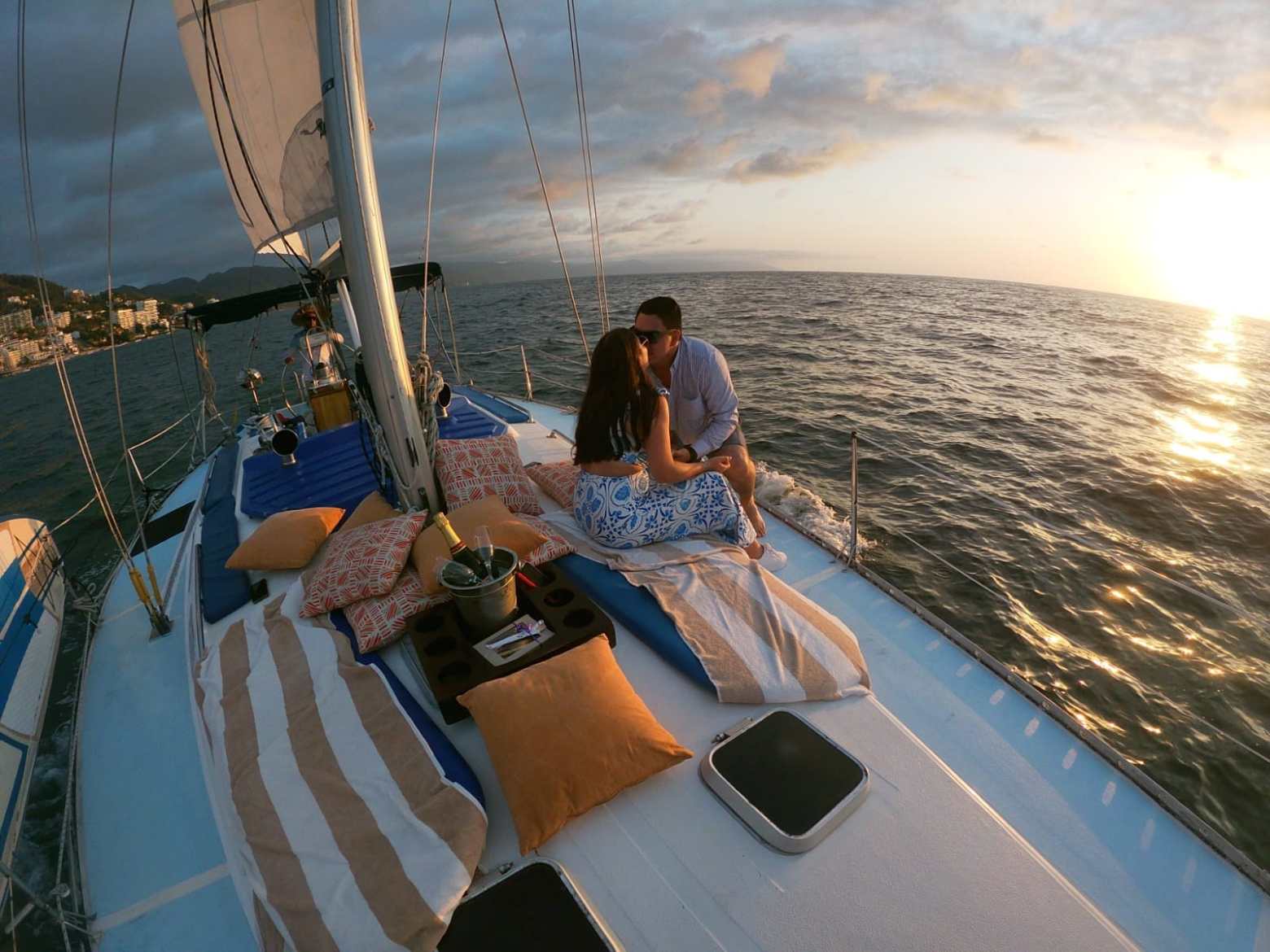 a person standing next to a body of water