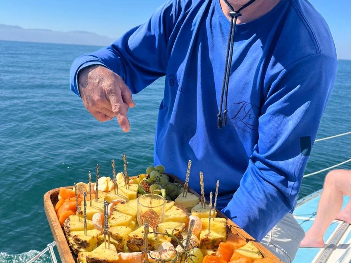 a man in a blue bowl filled with water