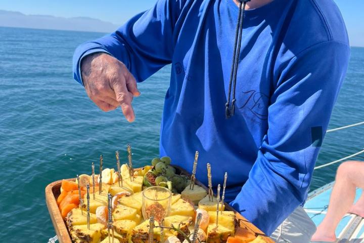 a man in a blue bowl filled with water