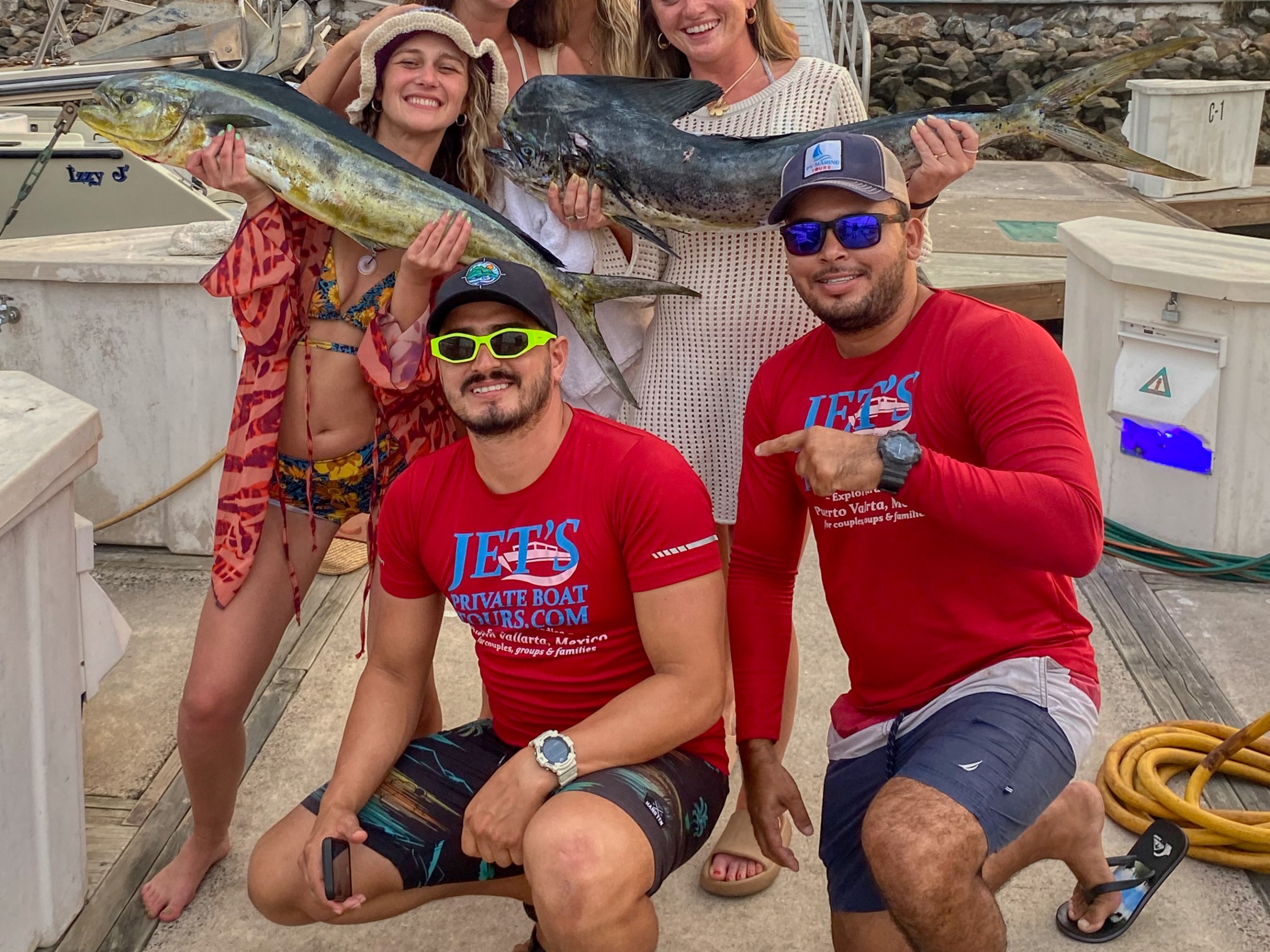 a group of people posing for the camera