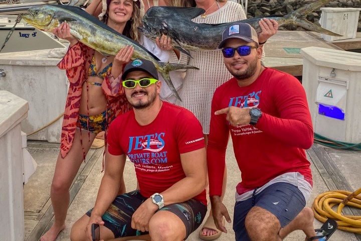 a group of people posing for the camera