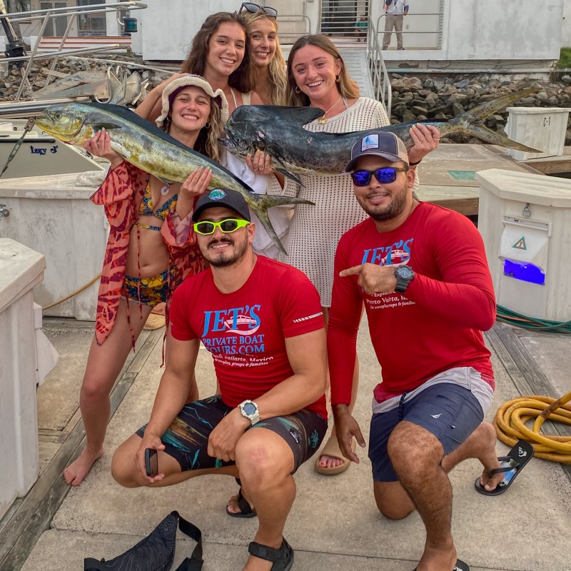 a group of people posing for the camera