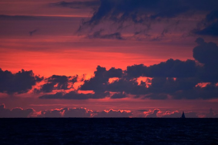 a sunset over a body of water
