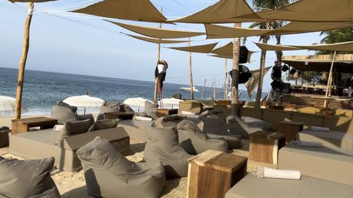 a close up of an umbrella on a beach