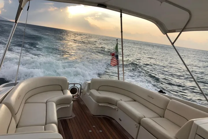 a boat parked next to a body of water