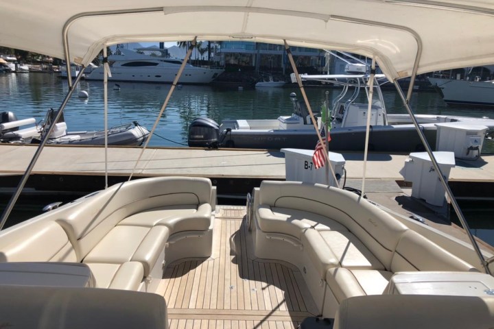 a boat sitting on top of a car