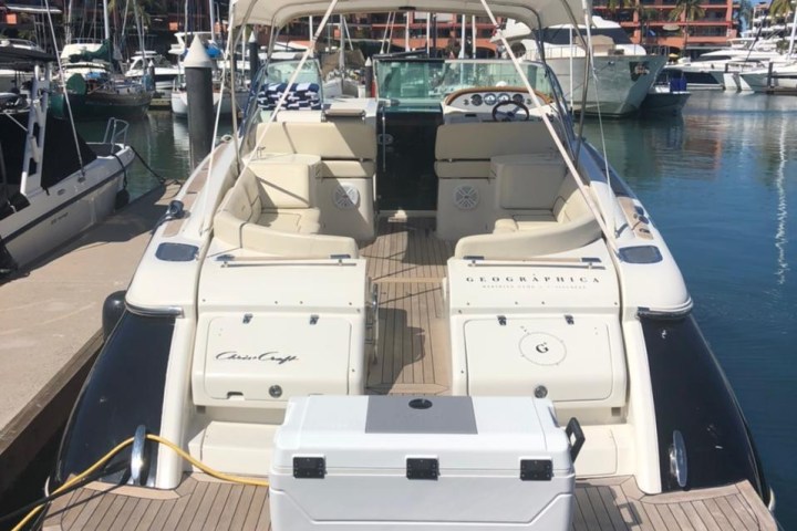 a boat is docked next to a body of water