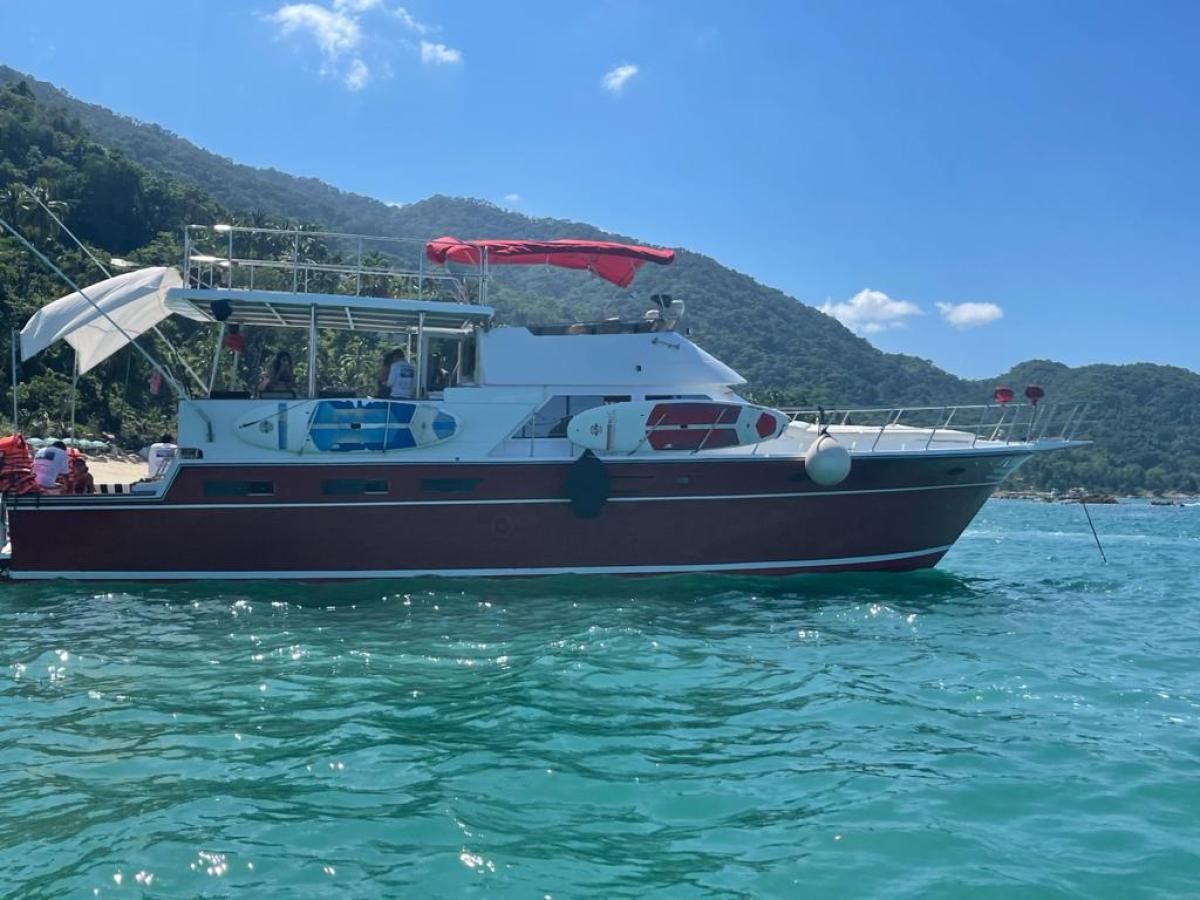 a small boat in a large body of water