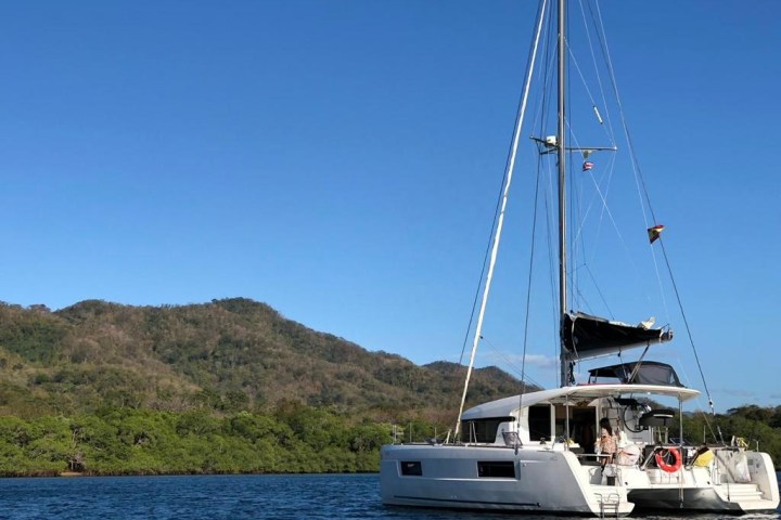 a small boat in a large body of water