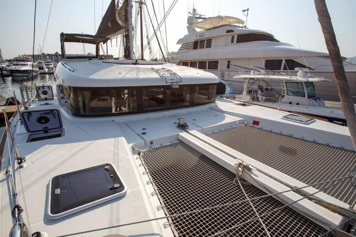 a boat sitting on top of a car