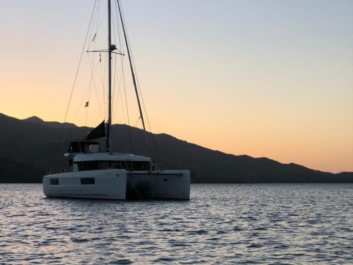 a small boat in a large body of water