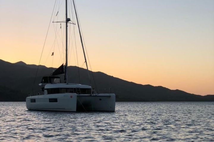 a small boat in a large body of water