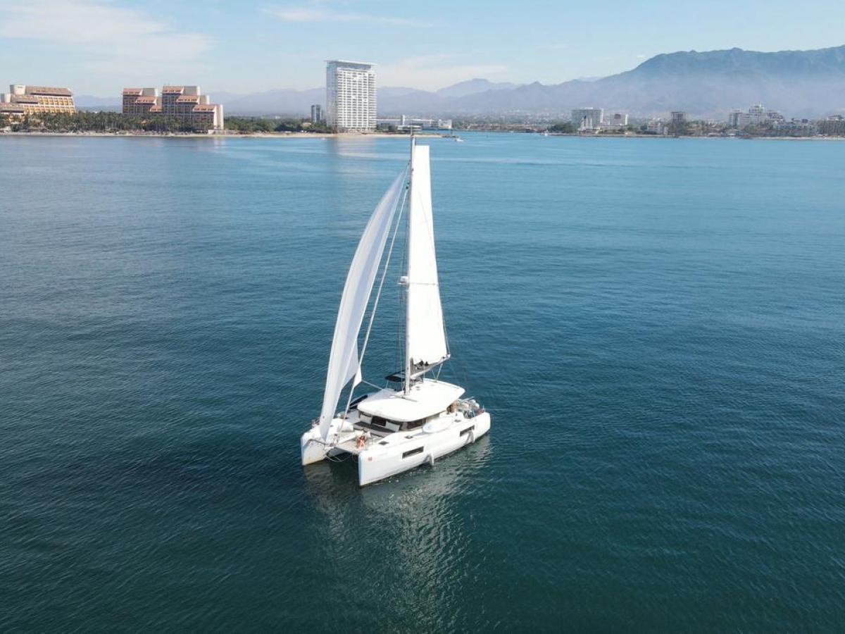 a small boat in a large body of water
