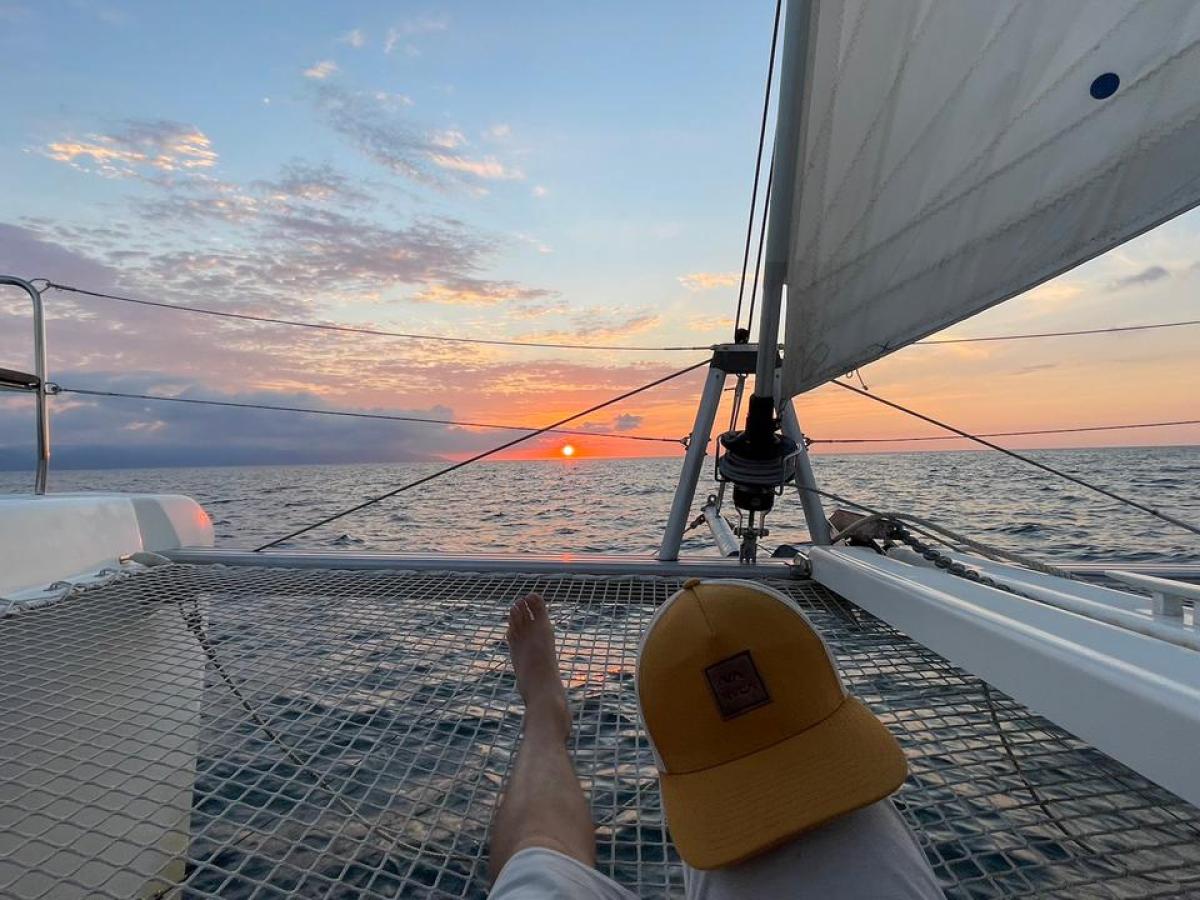 a boat sitting on top of a beach
