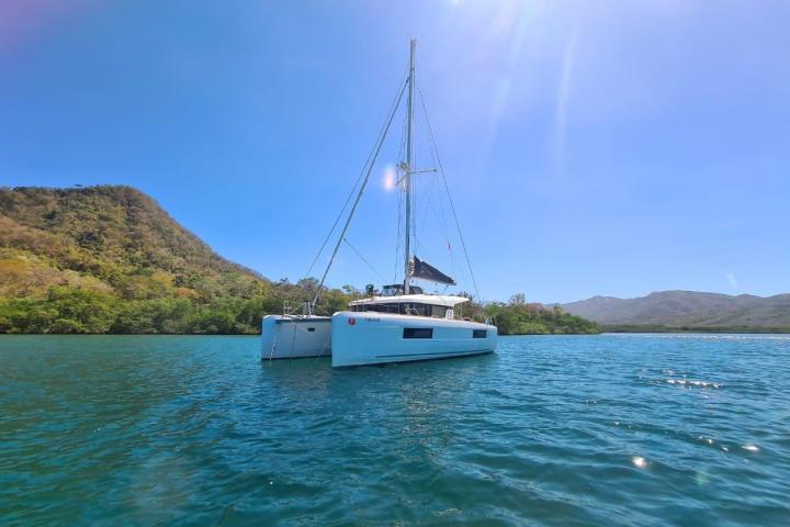 a small boat in a large body of water