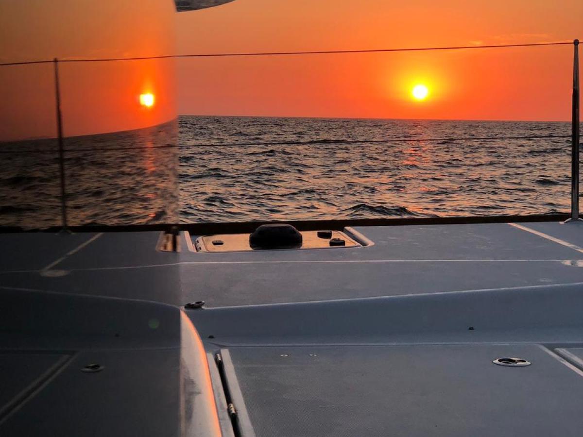 a close up of a boat next to a body of water