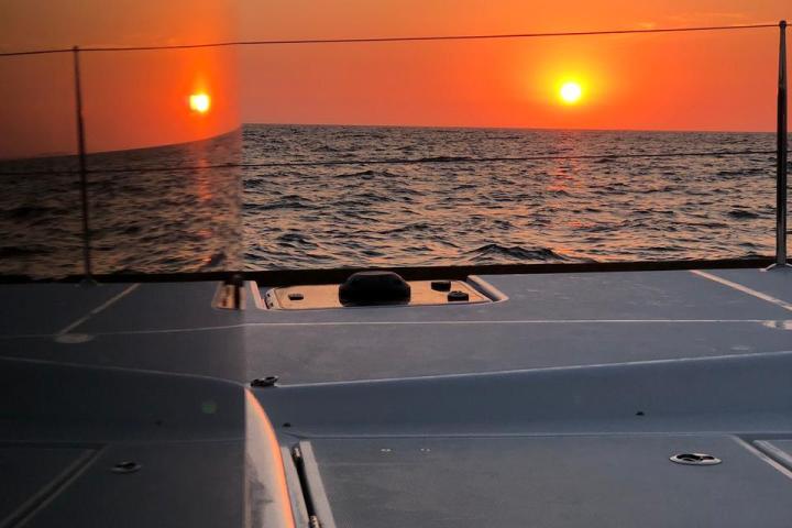 a close up of a boat next to a body of water