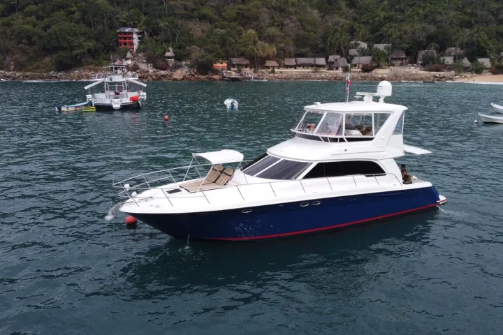 a small boat in a body of water